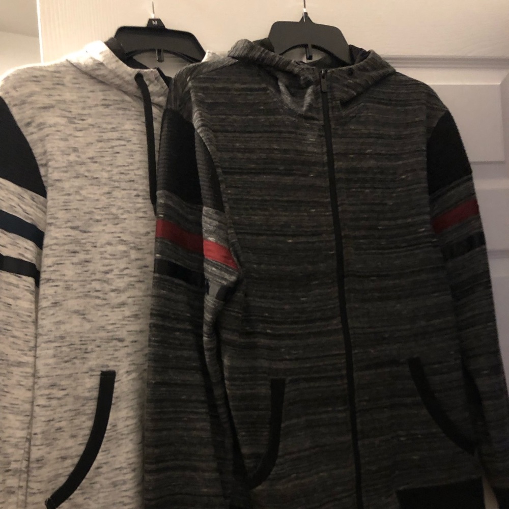 2 men’s zipper jackets.